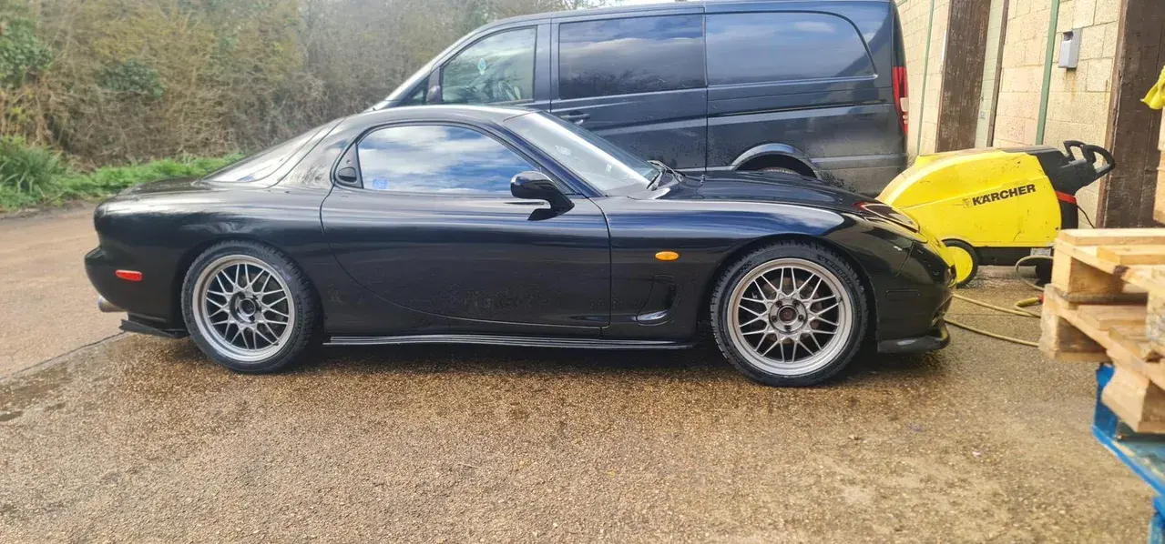 Dark blue sports coupe with BBS alloy wheels