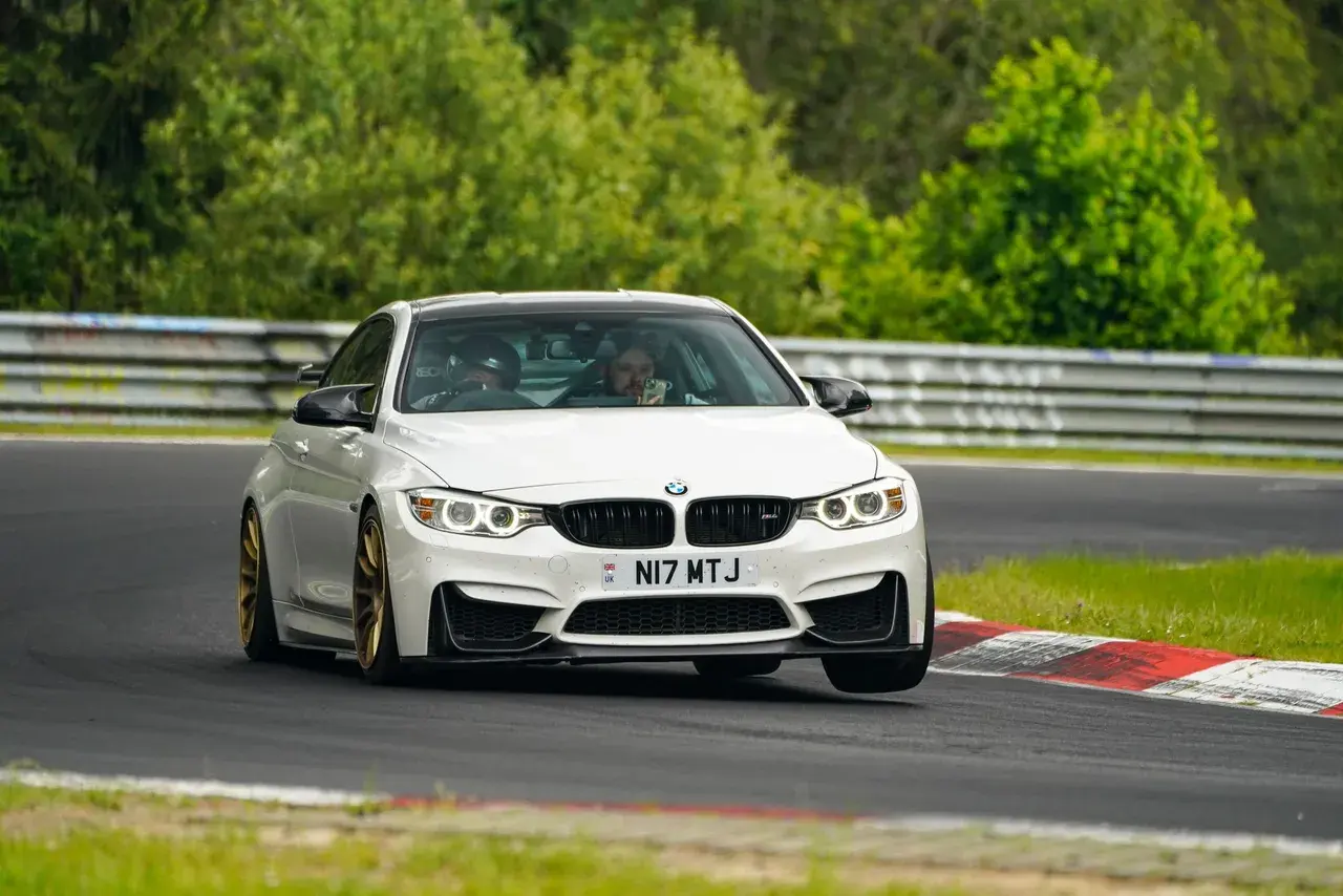White BMW M3 on track at the Nürburgring