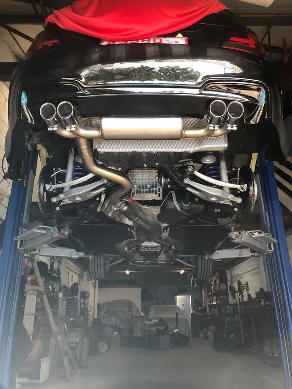 BMW M quad-exit exhaust seen from below
